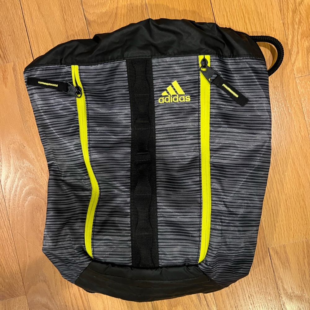 Adidas drawstring backpack.  never used.  neon yellow accents.